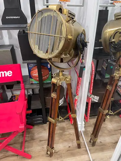 Extremely beautiful and rare floor lamp with fully hand made brass and wood detailing Only display a...