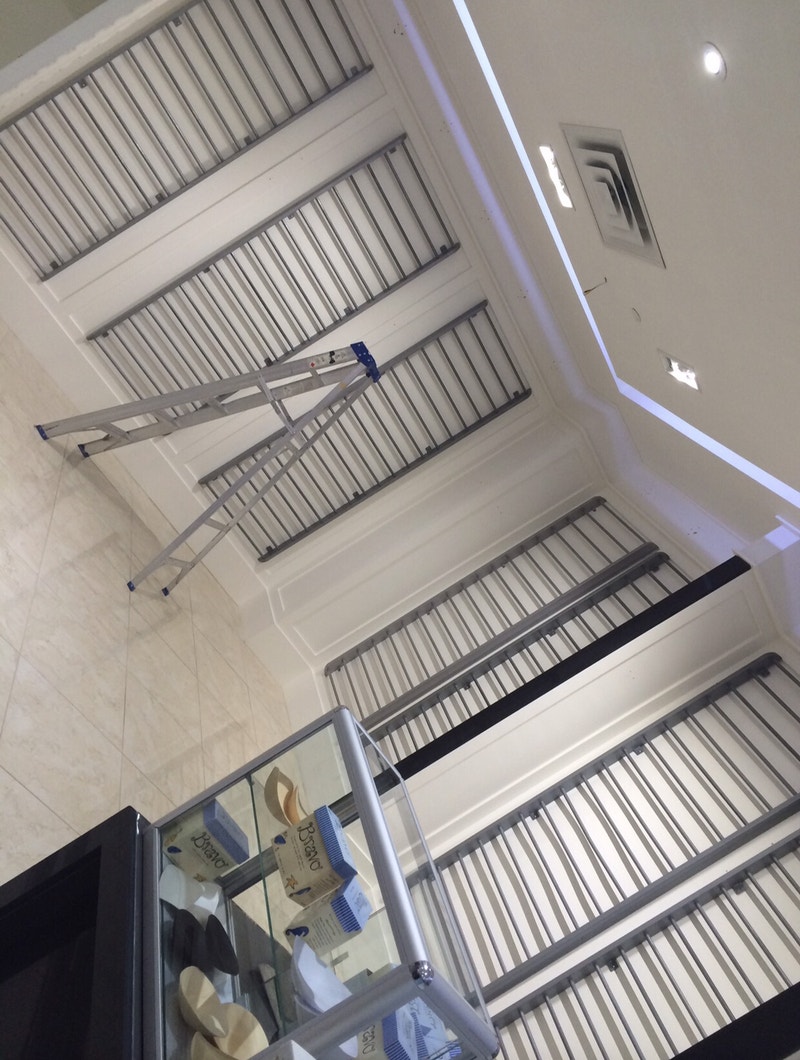 Retail metal clothing store display fixtures racks shelving