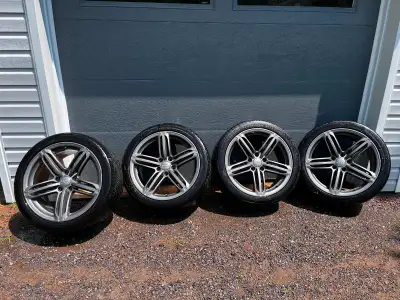 Amazing tires! Only used one summer, Lots of thread left, I only put 10k on them. Alloy rims are sto...