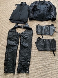 Women's size small motorcycle jacket & chaps plus extras.
