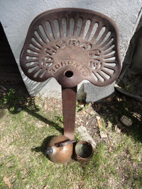 Cast Iron Tractor Seat "THE RAKE" with stand