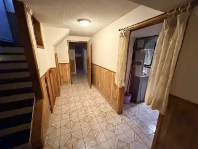 Basement unit with 2 bedrooms, 1 living room, 1kitchen and 1 bathroom, featuring a separate private...