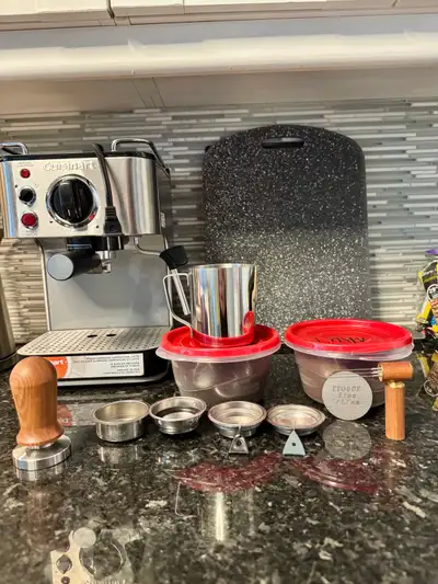 Cuisinart EM-100NAS espresso machine (15 bar pressure) in great working condition. Perfect for makin...