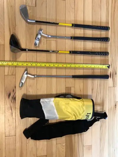 Kids golf clubs (4) with bag (1) and balls (2)