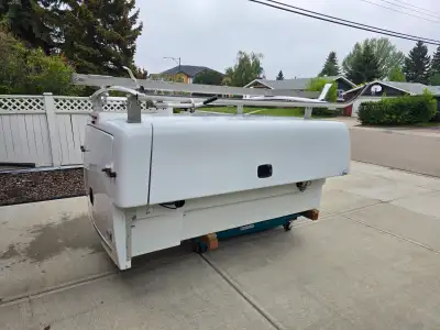 8' Maranda Service Body polished and ready for use. Includes ladder rack, back-up camera, back-up al...