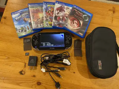PlayStation Vita w/ Case, Charger & 2 Memory Cards, View more