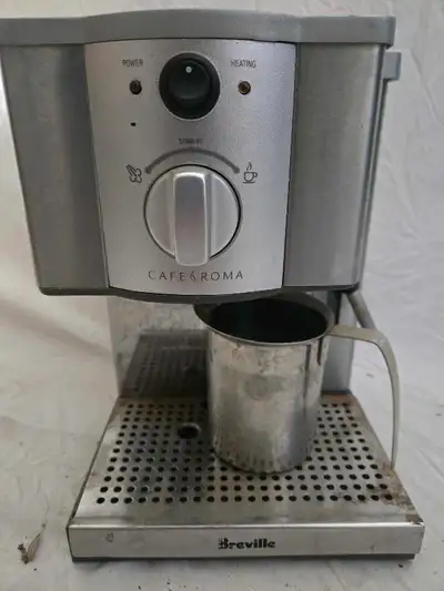 Brew a cup of espresso with this Breville Cafe Roma! This espresso machine is a basic model in used...