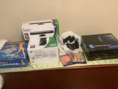 Bundle includes - Xbox 360 s console, 250 GB. PlayStation 2. Xbox 360 Kinect sensor. Digi dance pad....