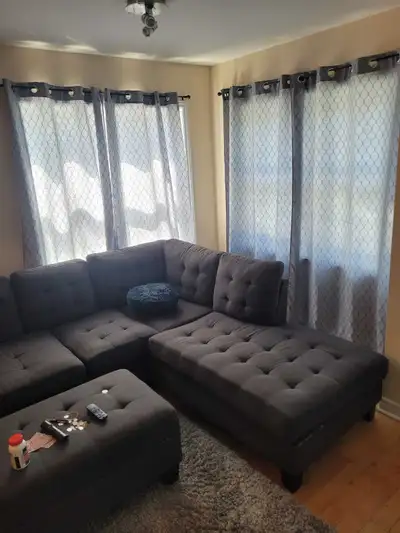 Bienvenue dans votre prochaine maison! Ce logement comprend un salon confortable avec un canapé sect...