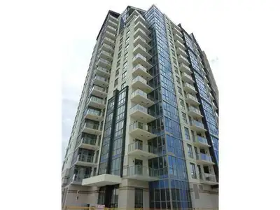 Contemporary 2 bed, 2 bath executive condo. very close to Bow River pathway. You can walk to +15 to...