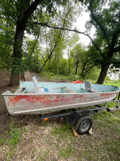 16' Lund (S-16), needs some tlc, has floor and 2 seats $400. Homemade heavy duty trailer with 13" ri...