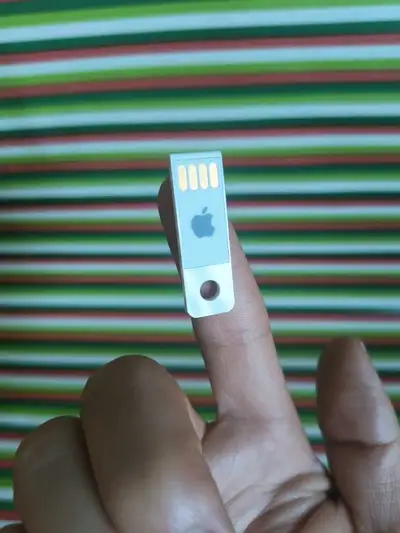 I'm selling a used Apple OS X Lion USB drive, model A1384, perfect for installing or reinstalling Ma...