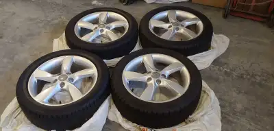 These are a set of four very lighty used Audi rims with Continental WinterContact TS830P winter tire...