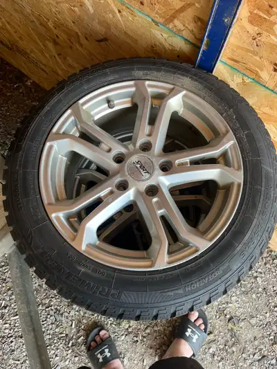 Set of aftermarket rims and snow tires tires are 80% tread all hold air the bolt pattern is 5x114.3...