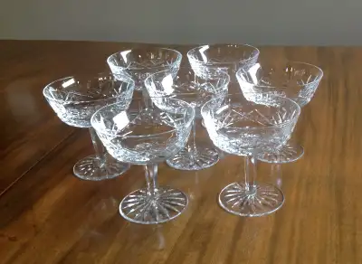 GENTLY USED. NO IMPERFECTIONS, CHIPS OR CLOUDING. SET INCLUDES: 7 CHAMPAGNE/TALL SHERBETS (4 1/4" Ta...