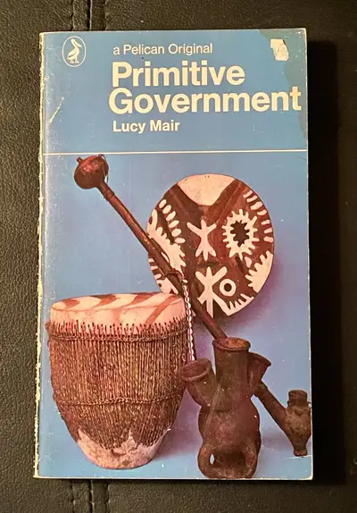 Explore the foundations of societal structures with this vintage Pelican Original "Primitive Governm...