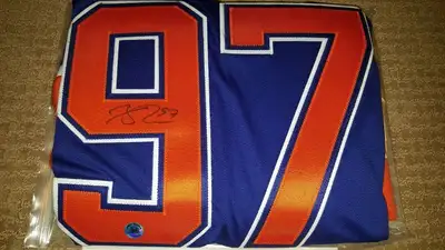 For sale is a signed Connor McDavid blue Reebok Edmonton Oilers Jersey with COA (Certificate of Auth...