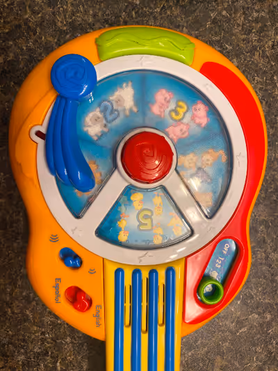 -Learn numbers /fun animal sounds and listen to tunes in English or Spanish! -well loved with lots o...