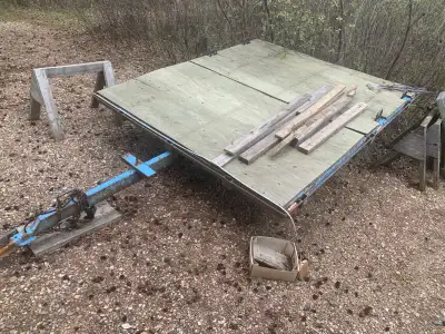 7’3” wide x 8’3 long flat deck trailer. No vin, will need new deck. Tires are holding air but should...