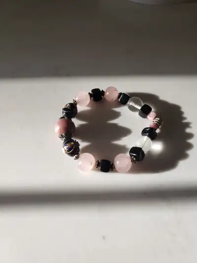 Purple, pink and black elastic beaded bracelet, View more