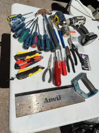 screwdrivers, pliers, hammer, tape measure, saw, Makita Concrete
