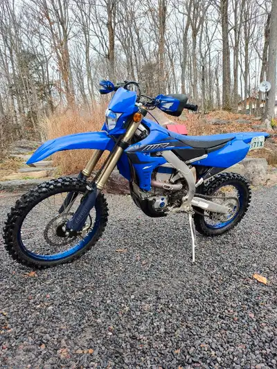 Practically new. Only ridden this past summer. Tons of power. Electric start. Fuel injected. 4 strok...