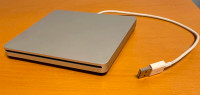 Apple USB SuperDrive (play and burn CDs, DVDs)