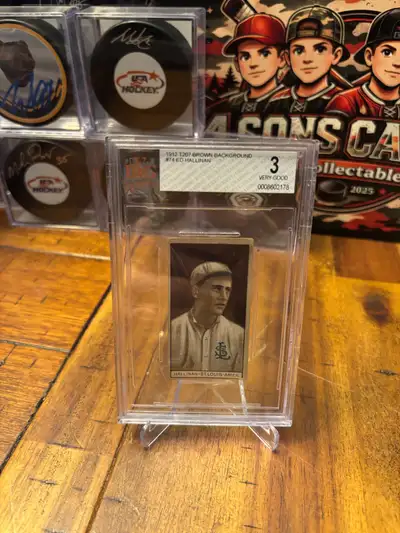 For sale is a vintage 1912 T207 Brown Background #74 Ed Hallinan baseball card, graded by BVG as a 3...
