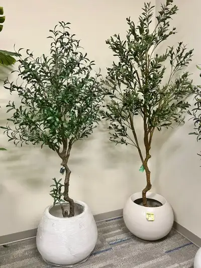 Bring timeless Mediterranean charm into your space with our high-quality Artificial Olive Tree. Desi...