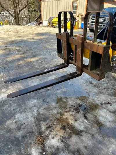 HLA heavy duty pallet forks great condition $1,200.00 obo
