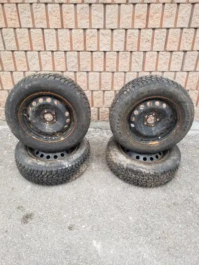 Good year nordic tires and rims Size 215 65r16 Dot 2412 Thread @ 9/32 Hub 64mm