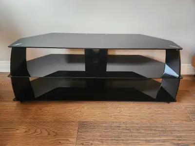 Black tempered glass TV stand, brand new condition. 54" L 20"H 18"D
