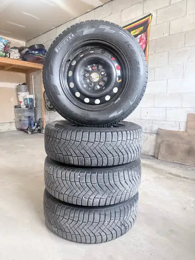 215/65/R16 Pirelli Ice zero R tires 85% tread remaining Bolt pattern 5x114.3 Centre bore 67.1 Locate...