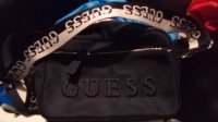 Brand new Guess Purse tags still on it