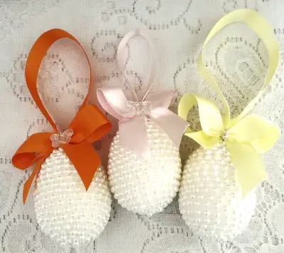 3 DECORATIVE HANDMADE WHITE EASTER EGGS HUNG FROM  SATIN RIBBON, View more