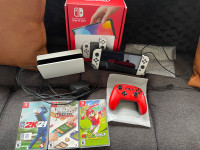 Brand New Nintendo Switch/ extra controller/4 games