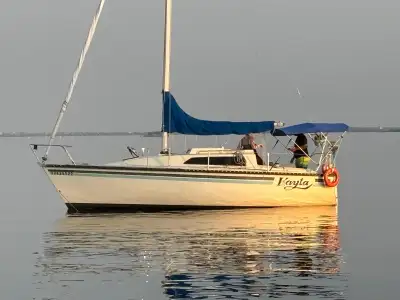 Set sail with this 1982 Kelt 7.6, a well-crafted Canadian-built sailboat known for its stability, pe...