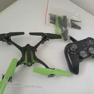 Best Offer Needs work Two propellers need to be fixed Worth Fixing Includes battery, charger, and re...