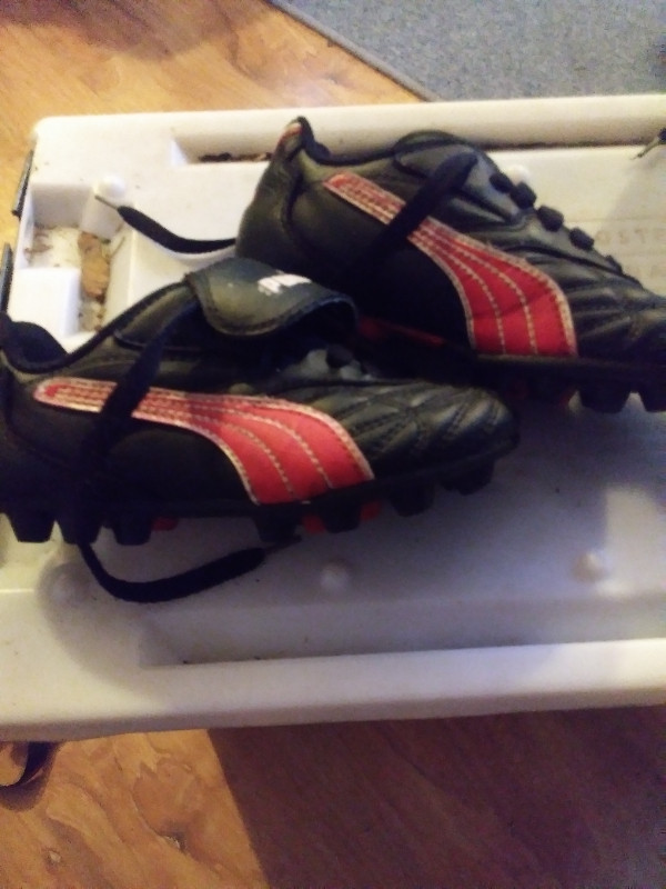 Child's black and red cleats in Soccer in Bridgewater