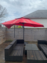 Outdoor umbrella with stand