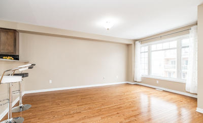Bright, airy 2-bedroom + den, 1.5-bath townhouse with large windows and abundant natural light. Feat...