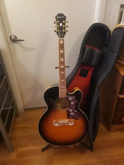 Epiphone dreadnought with cutaway. Payed $800 brand new in 2020 Excellent guitar. Plays great. Comes...