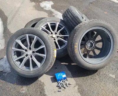 5 tires , 4 on alloy RTX rims with TPMS. 3/16"/5mm tread left. Wheels have 5x115 bolt pattern. Compl...