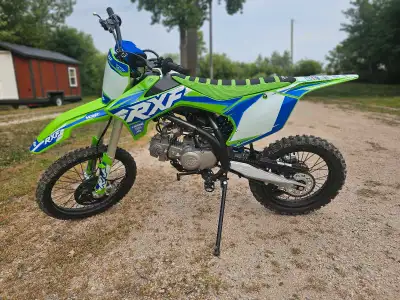 Unleash your inner daredevil with the RXF Freeride — the dirt bike built for young thrill-seekers re...