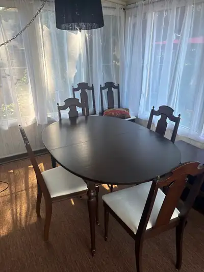 Antique table and 6 chairs., View more