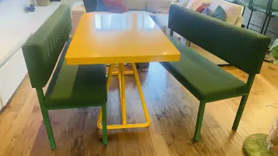 Table steel on pedestal Bright yellow. Clean with some minor paint chips. 30x51” table top 30” tall...