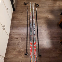 186cm Salomon Cross Country Skis with Poles $295170cm poles $65S