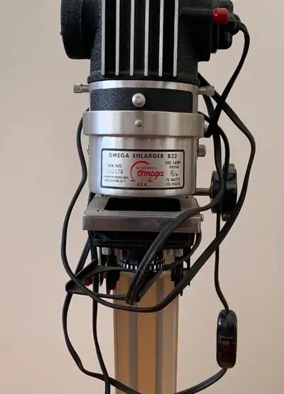 Omega Enlarger B22 with timer included and other developing goodies.