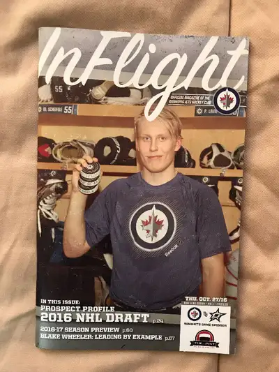 Game program from Dallas vs Winnipeg matchup where Jets' Kyle Connor scores his 1st NHL goal Cover f...