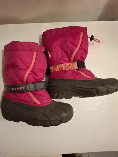 I'm selling a pair of used Sorel winter boots, perfect for keeping your little one's feet warm and d...